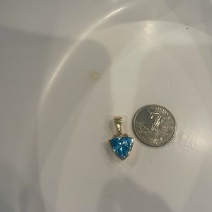 Beautiful triangular cut blue topaz with pendant